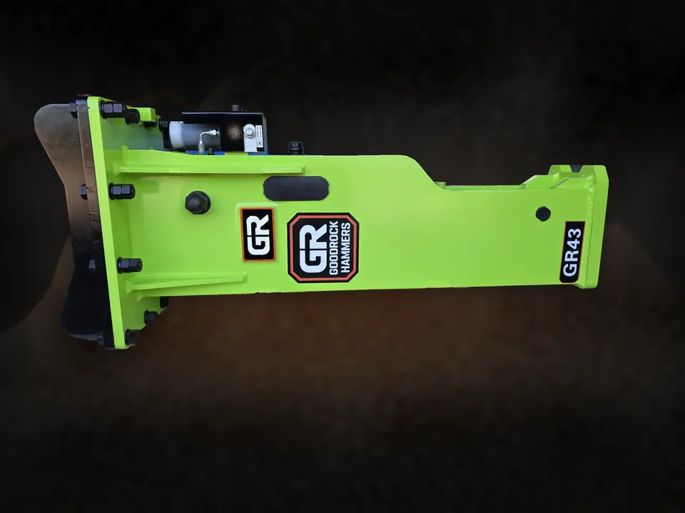 Side profile of a GoodRock hydraulic breaker showing the mounting bracket, greaser assembly and GR decals